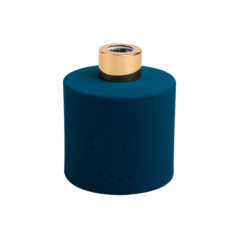 Sternblaue Duftflasche mit goldener Kappe